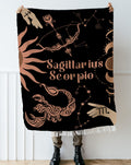 Sagittarius and Scorpio Zodiac Compatibility Woven Throw Tapestry - Elevate home decor with this boho-inspired, celestial charm blanket. Perfect for astrology enthusiasts, featuring Sagittarius and Scorpio sun signs, adding unique, artistic flair to your living space. Premium cotton, cozy, and decorative.