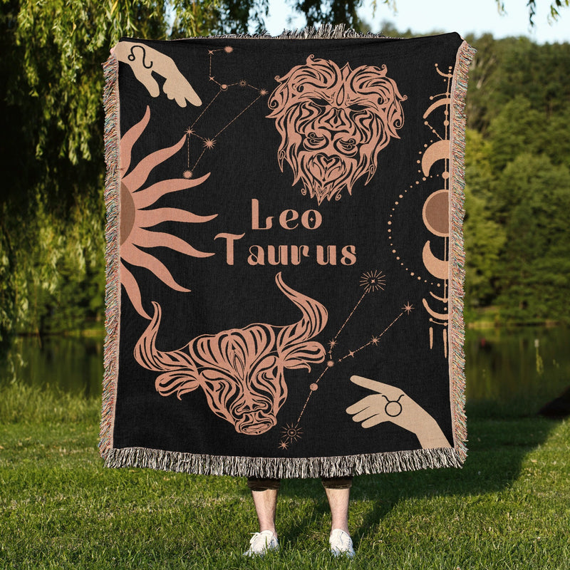 Taurus and Leo Zodiac Compatibility Woven Throw Tapestry - Elevate home decor with this boho-inspired, celestial charm blanket. Perfect for astrology enthusiasts, featuring Taurus and Leo sun signs, adding unique, artistic flair to your living space. Premium cotton, cozy, and decorative.