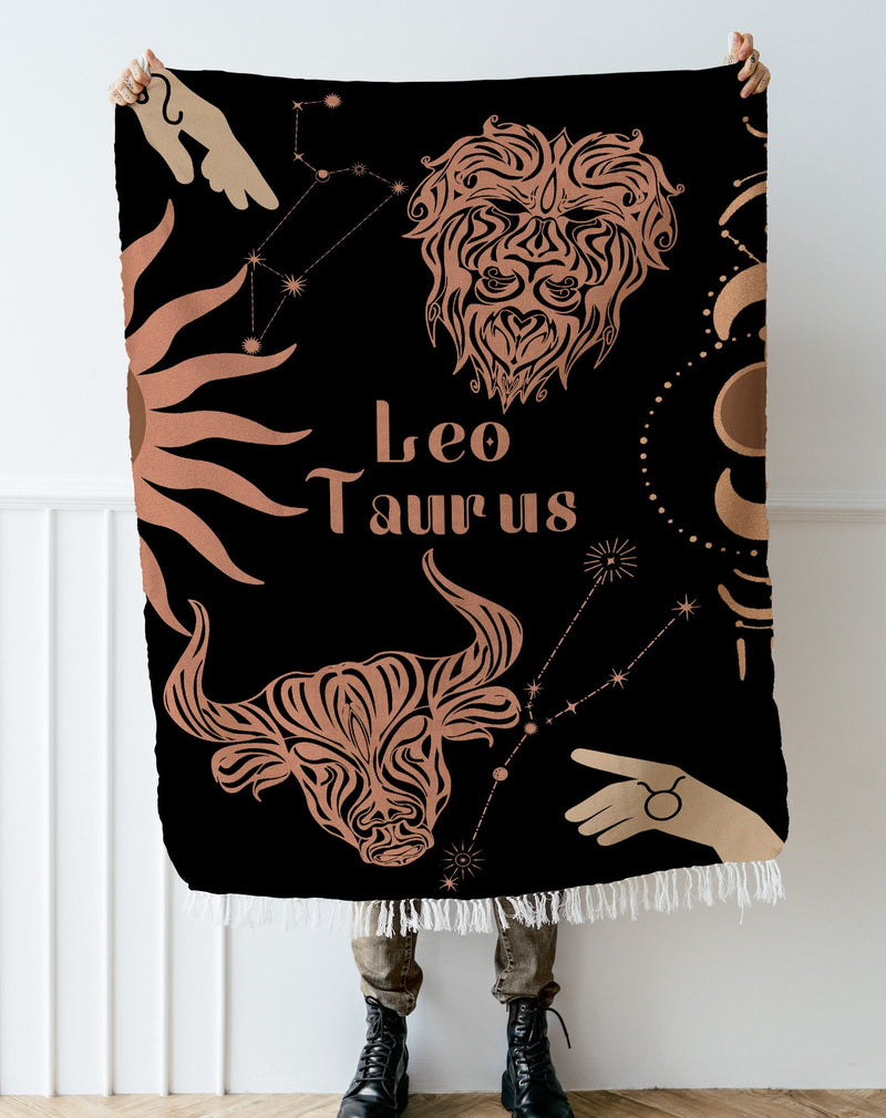 Taurus and Leo Zodiac Compatibility Woven Throw Tapestry - Elevate home decor with this boho-inspired, celestial charm blanket. Perfect for astrology enthusiasts, featuring Taurus and Leo sun signs, adding unique, artistic flair to your living space. Premium cotton, cozy, and decorative.