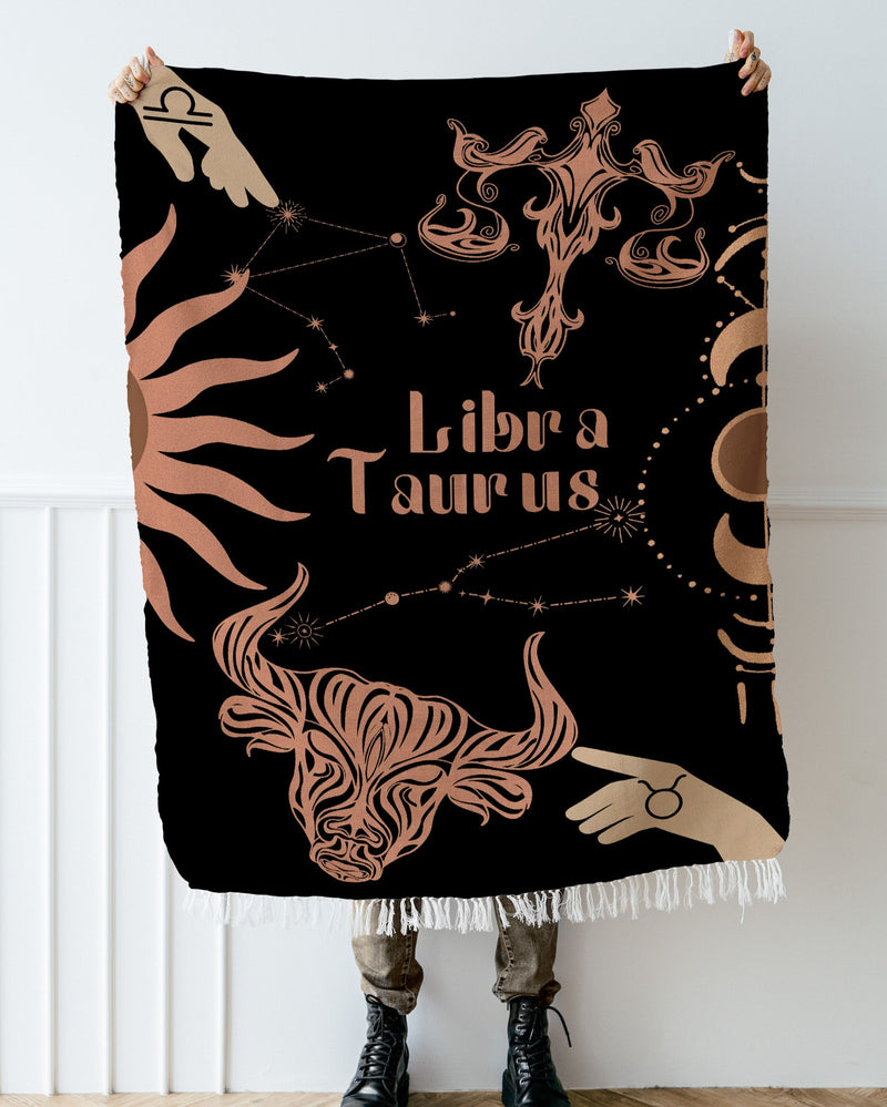 Taurus and Libra Zodiac Compatibility Woven Throw Tapestry - Elevate home decor with this boho-inspired, celestial charm blanket. Perfect for astrology enthusiasts, featuring Taurus and Libra sun signs, adding unique, artistic flair to your living space. Premium cotton, cozy, and decorative.