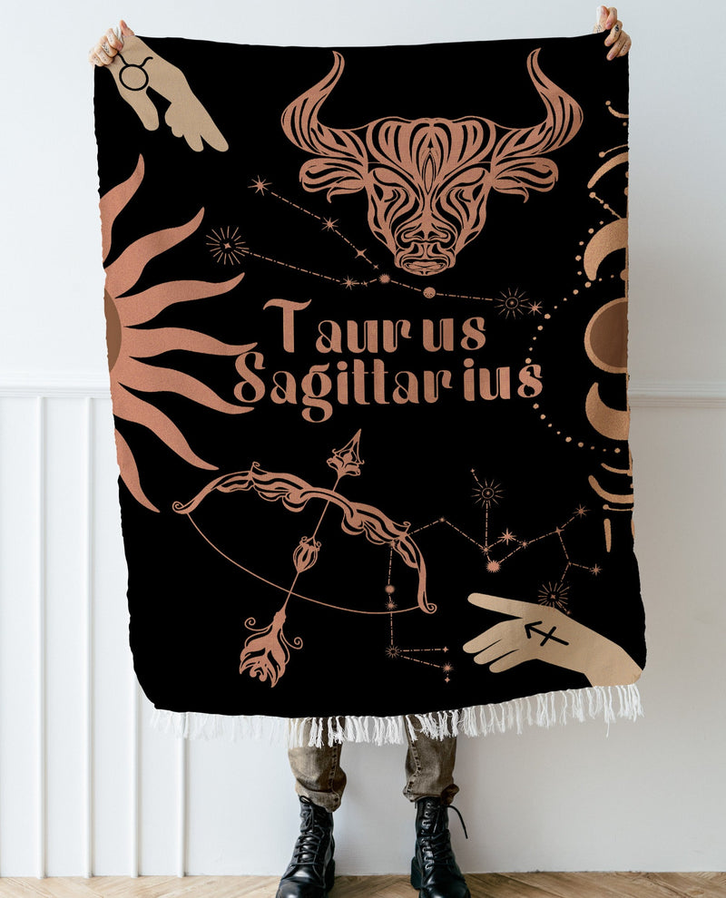 Taurus and Sagittarius Zodiac Compatibility Woven Throw Tapestry - Elevate home decor with this boho-inspired, celestial charm blanket. Perfect for astrology enthusiasts, featuring Taurus and Sagittarius sun signs, adding unique, artistic flair to your living space. Premium cotton, cozy, and decorative.