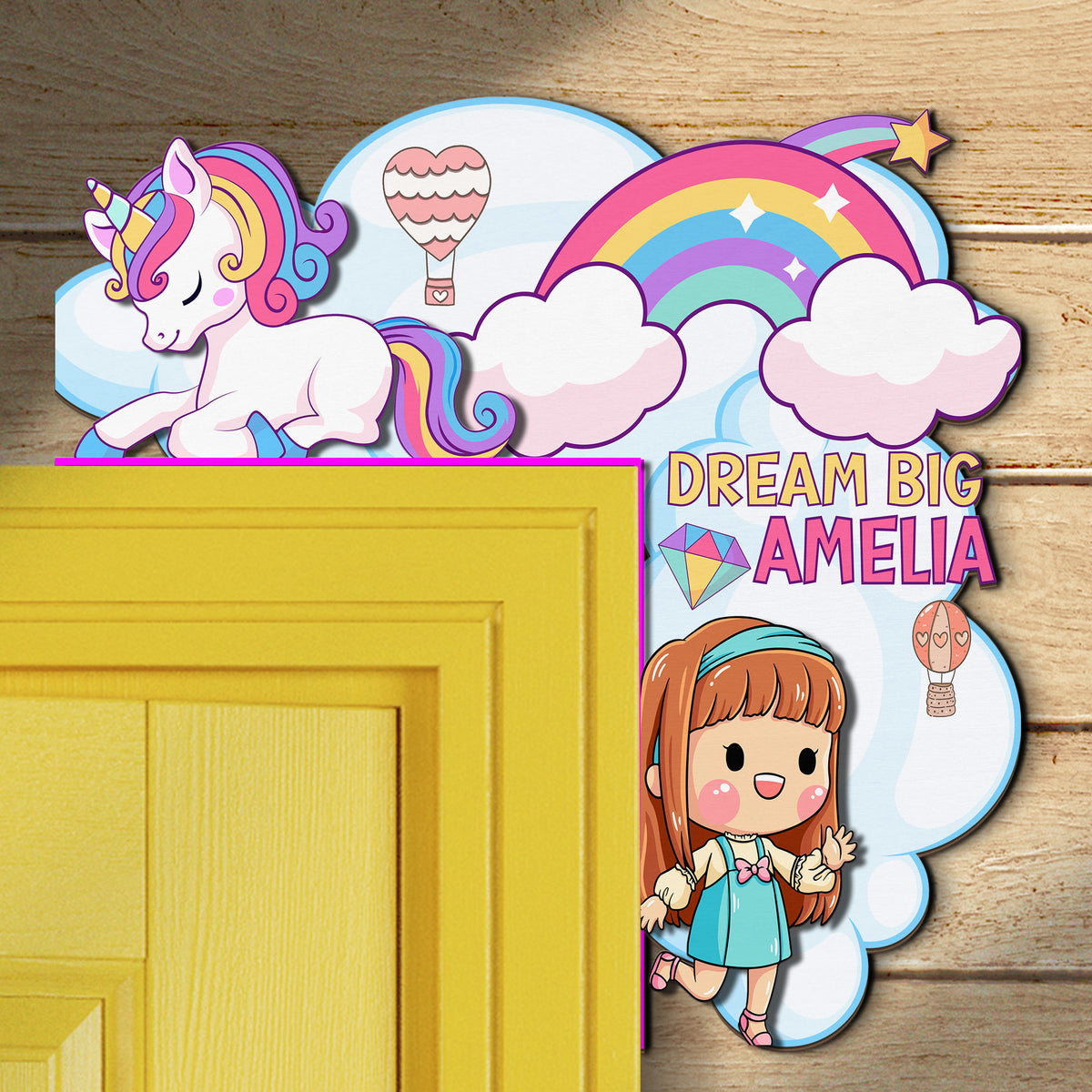 Double-layer personalized unicorn wooden door name sign displayed on a yellow door