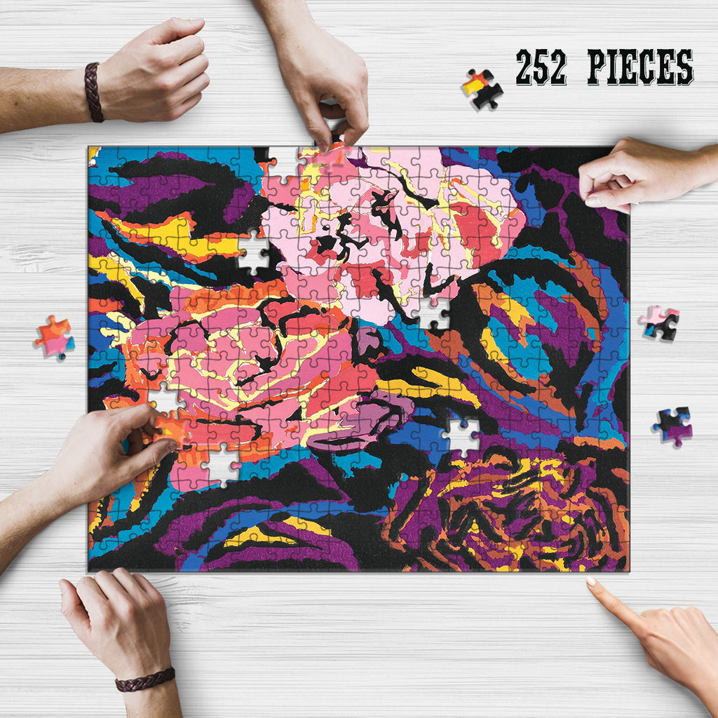 Hands assembling 252-piece Watercolor Roses wooden puzzle