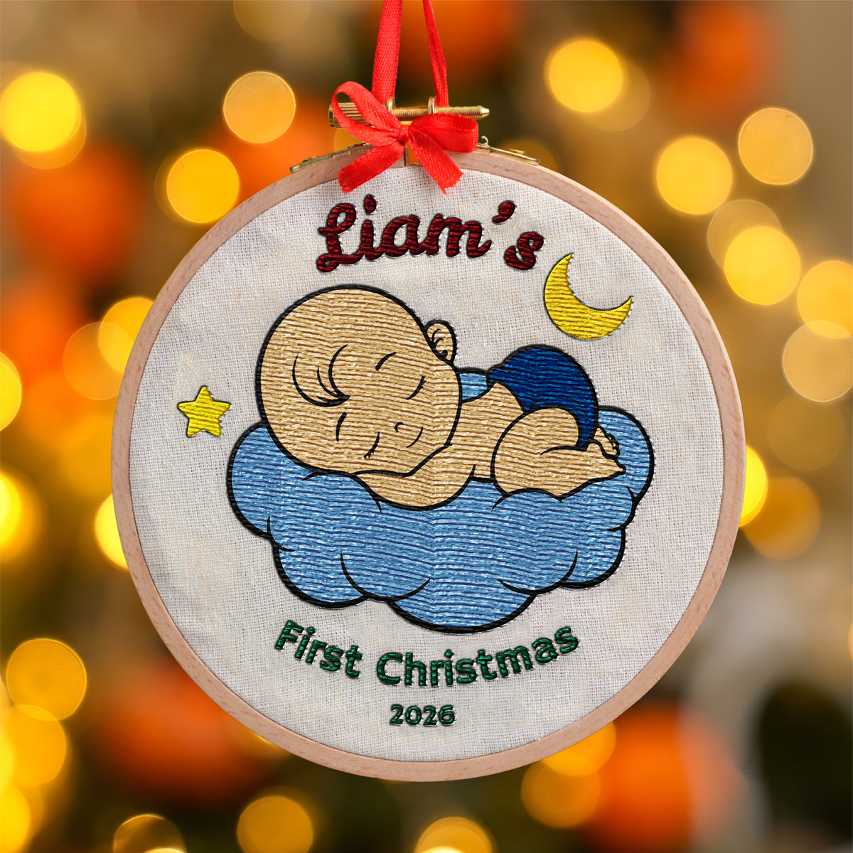 Personalized baby's first Christmas embroidered hoop ornament with sleeping baby on blue cloud, moon and star – additional view of embroidered baby keepsake