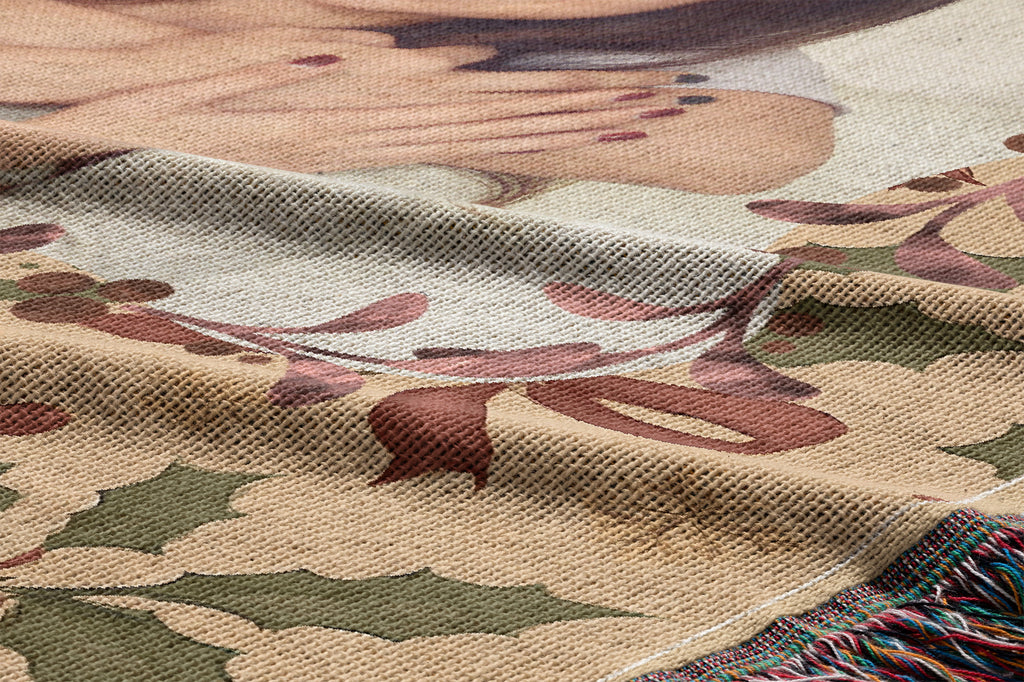 Close-up of cotton woven Christmas photo blanket with multicolored fringe