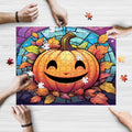 Halloween pumpkin stained glass art wooden jigsaw puzzle. A colorful jigsaw puzzle depicting a smiling pumpkin with leaves.