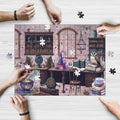 Wizard Workshop and Owl wooden jigsaw puzzle being assembled on a table