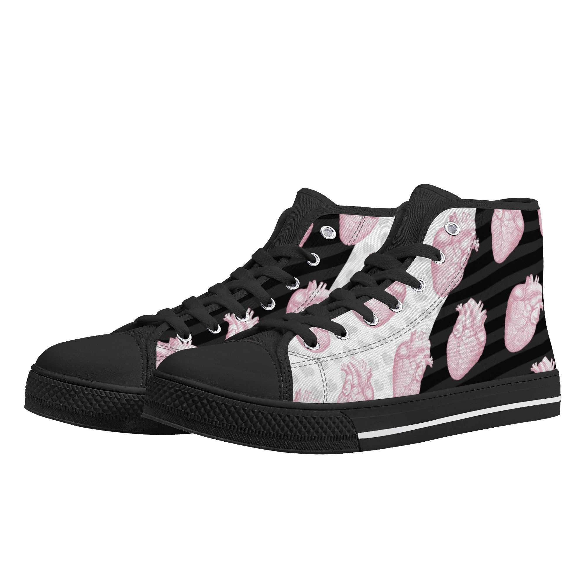 Black soles close up Pastel goth Halloween high-top shoes with skull and spooky heart design