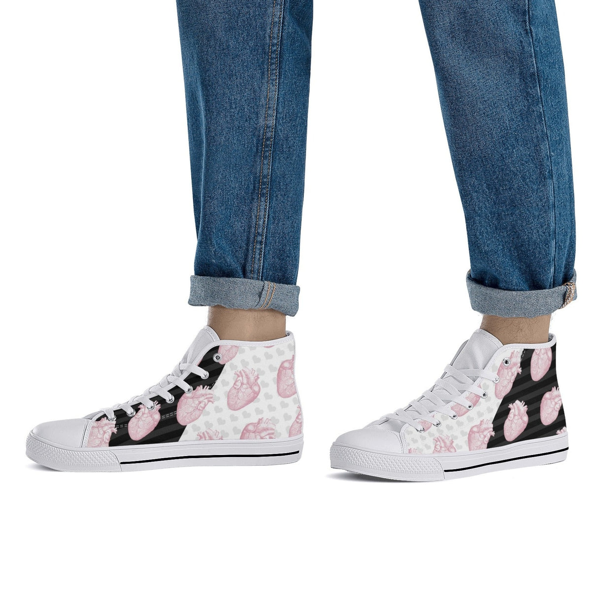 feet view of white soles Pastel goth Halloween high-top shoes with skull and spooky heart design